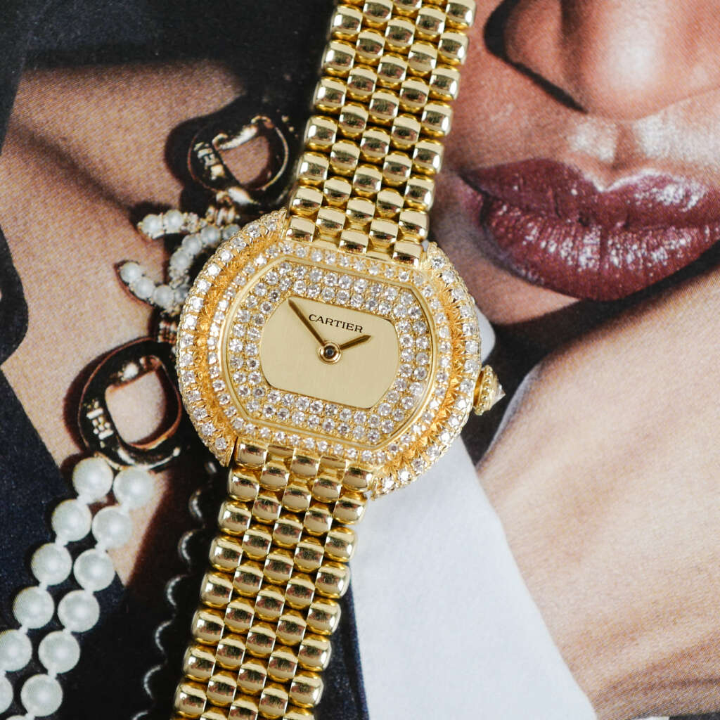 Café Noir Les Montres Marseille Cartier Ellipse femme réf. 67081 bracelet en maille en or jaune 18 carats diamants bracelet serpent commande spéciale vintage 1990