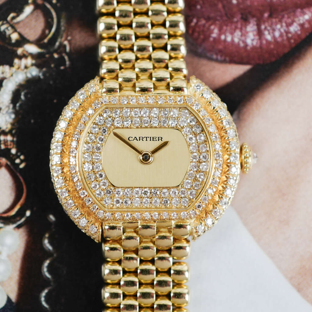Café Noir Les Montres Marseille Cartier Ellipse femme réf. 67081 bracelet en maille en or jaune 18 carats diamants bracelet serpent commande spéciale vintage 1990