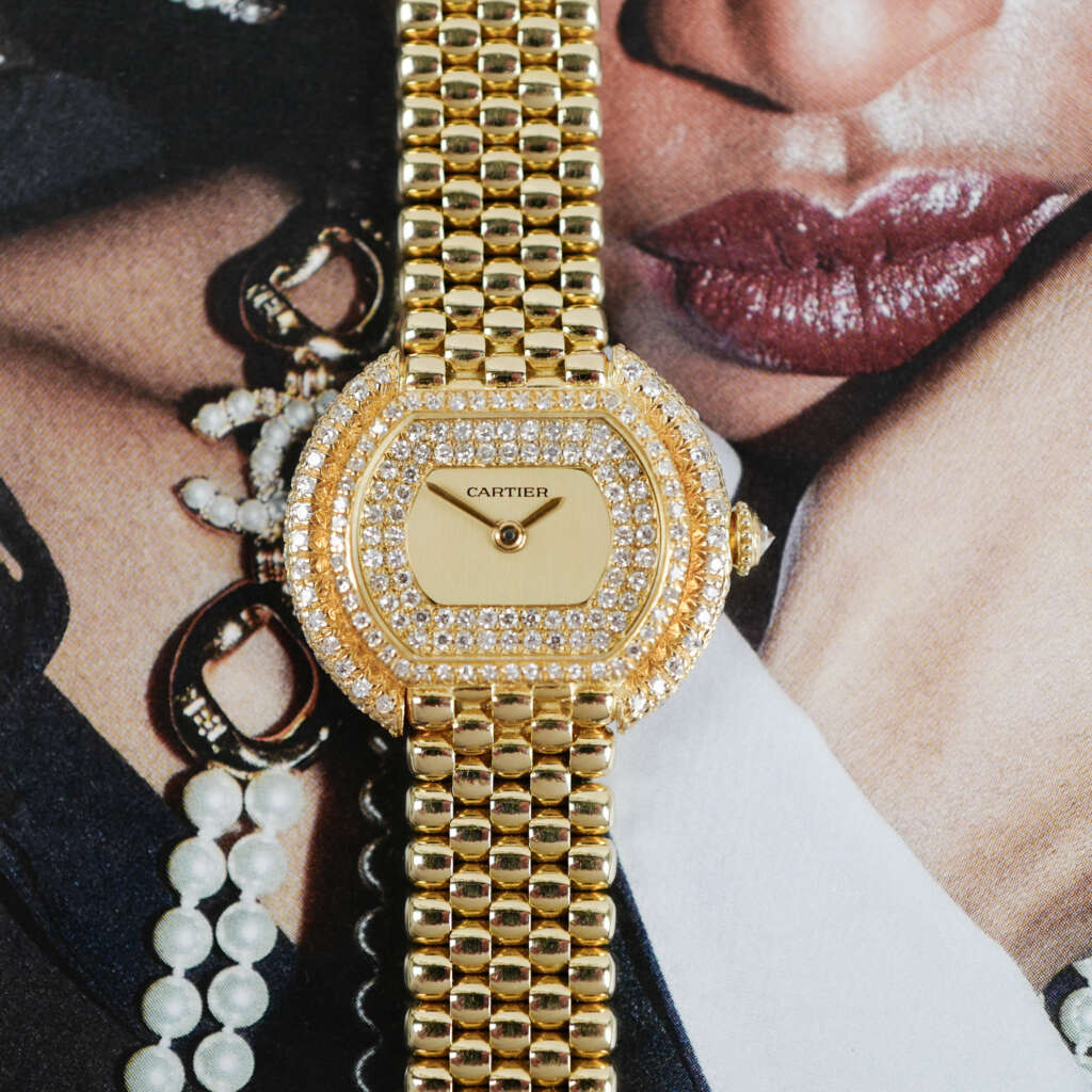 Café Noir Les Montres Marseille Cartier Ellipse femme réf. 67081 bracelet en maille en or jaune 18 carats diamants bracelet serpent commande spéciale vintage 1990