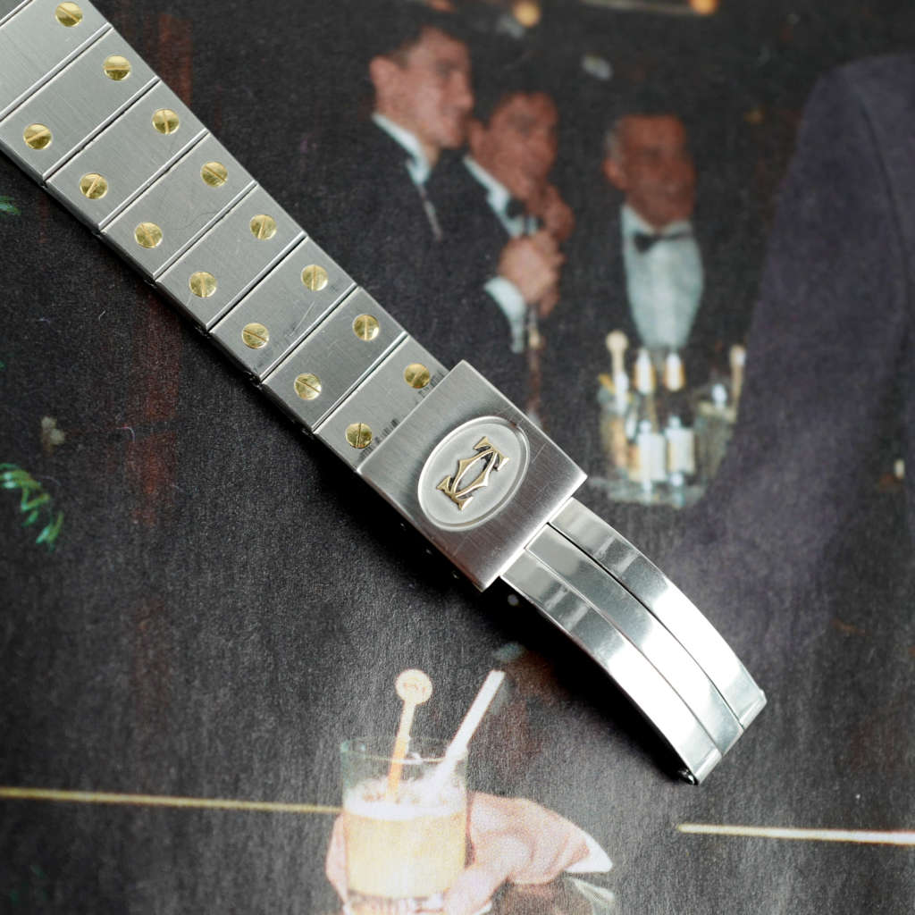 Café Noir Les Montres Marseille Cartier Ellipse femme réf. 67081 bracelet en maille en or jaune 18 carats diamants bracelet serpent commande spéciale vintage 1980 bicolore