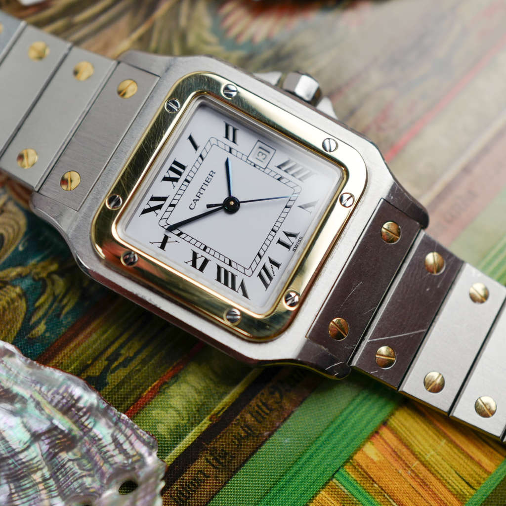 Café Noir Les Montres Marseille Cartier Ellipse femme réf. 67081 bracelet en maille en or jaune 18 carats diamants bracelet serpent commande spéciale vintage 1980 bicolore
