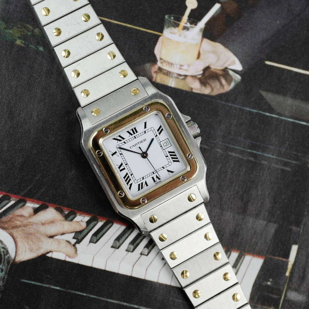 Café Noir Les Montres Marseille Cartier Ellipse femme réf. 67081 bracelet en maille en or jaune 18 carats diamants bracelet serpent commande spéciale vintage 1980 bicolore