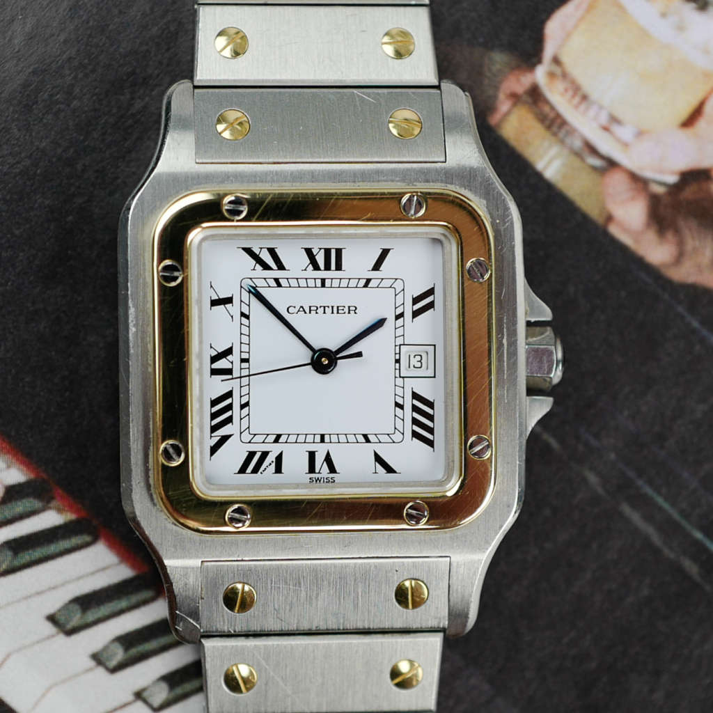 Café Noir Les Montres Marseille Cartier Ellipse femme réf. 67081 bracelet en maille en or jaune 18 carats diamants bracelet serpent commande spéciale vintage 1980 bicolore