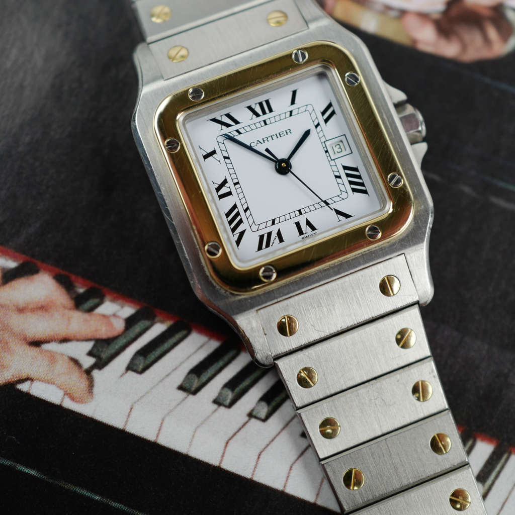 Café Noir Les Montres Marseille Cartier Ellipse femme réf. 67081 bracelet en maille en or jaune 18 carats diamants bracelet serpent commande spéciale vintage 1980 bicolore