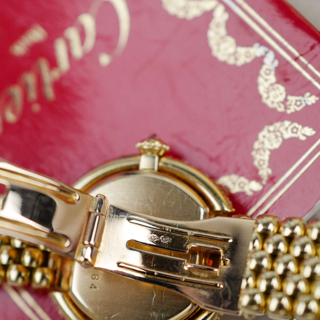 Café Noir Les Montres Marseille Cartier Ellipse femme réf. 67081 bracelet en maille en or jaune 18 carats diamants bracelet serpent commande spéciale vintage 1990