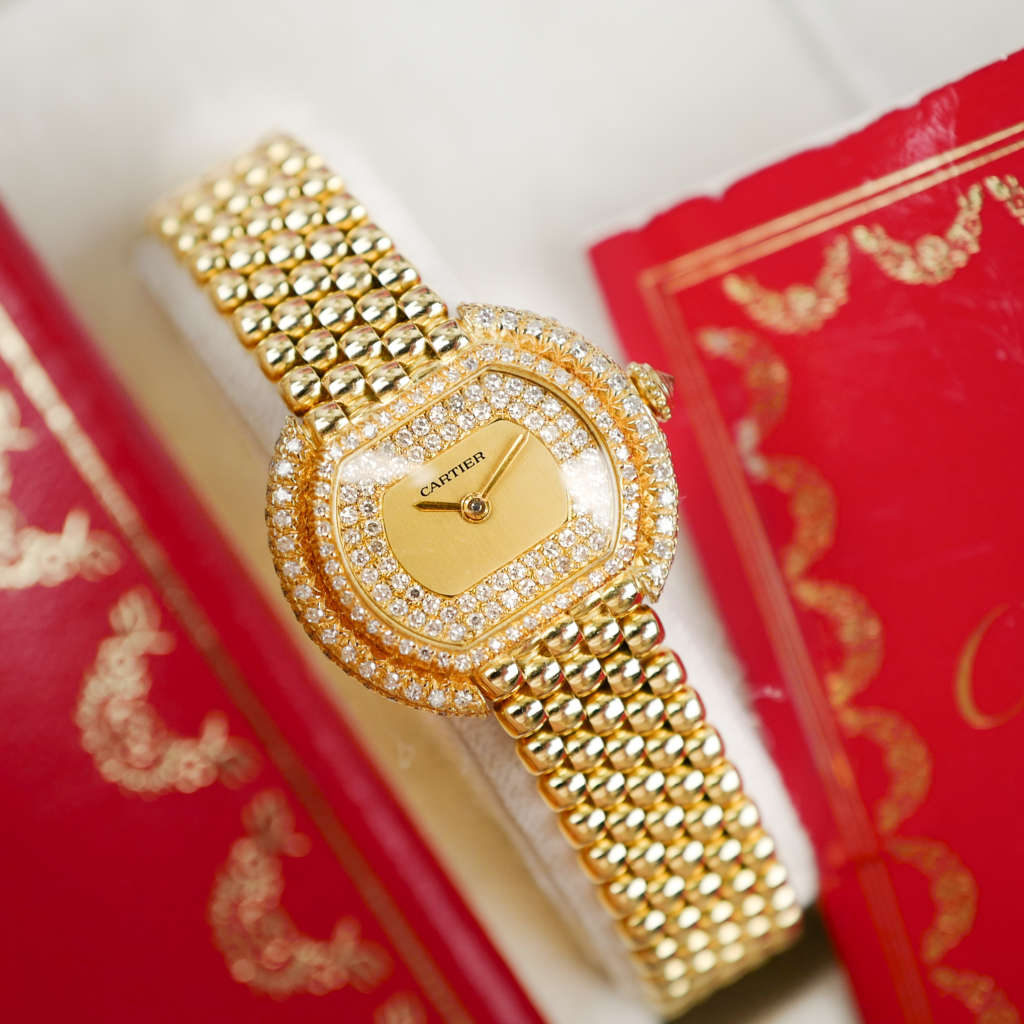 Café Noir Les Montres Marseille Cartier Ellipse femme réf. 67081 bracelet en maille en or jaune 18 carats diamants bracelet serpent commande spéciale vintage 1990