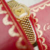 Café Noir Les Montres Marseille Cartier Ellipse femme réf. 67081 bracelet en maille en or jaune 18 carats diamants bracelet serpent commande spéciale vintage 1990