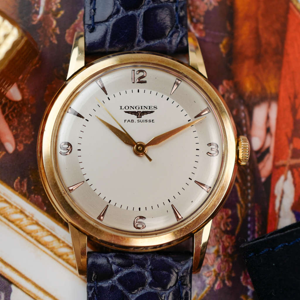 cafe noir les montre horloger marseille longines-fab-suisse-or-18k-1955