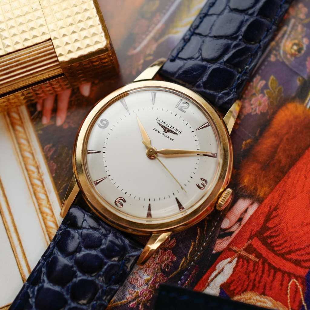 cafe noir les montre horloger marseille longines-fab-suisse-or-18k-1955