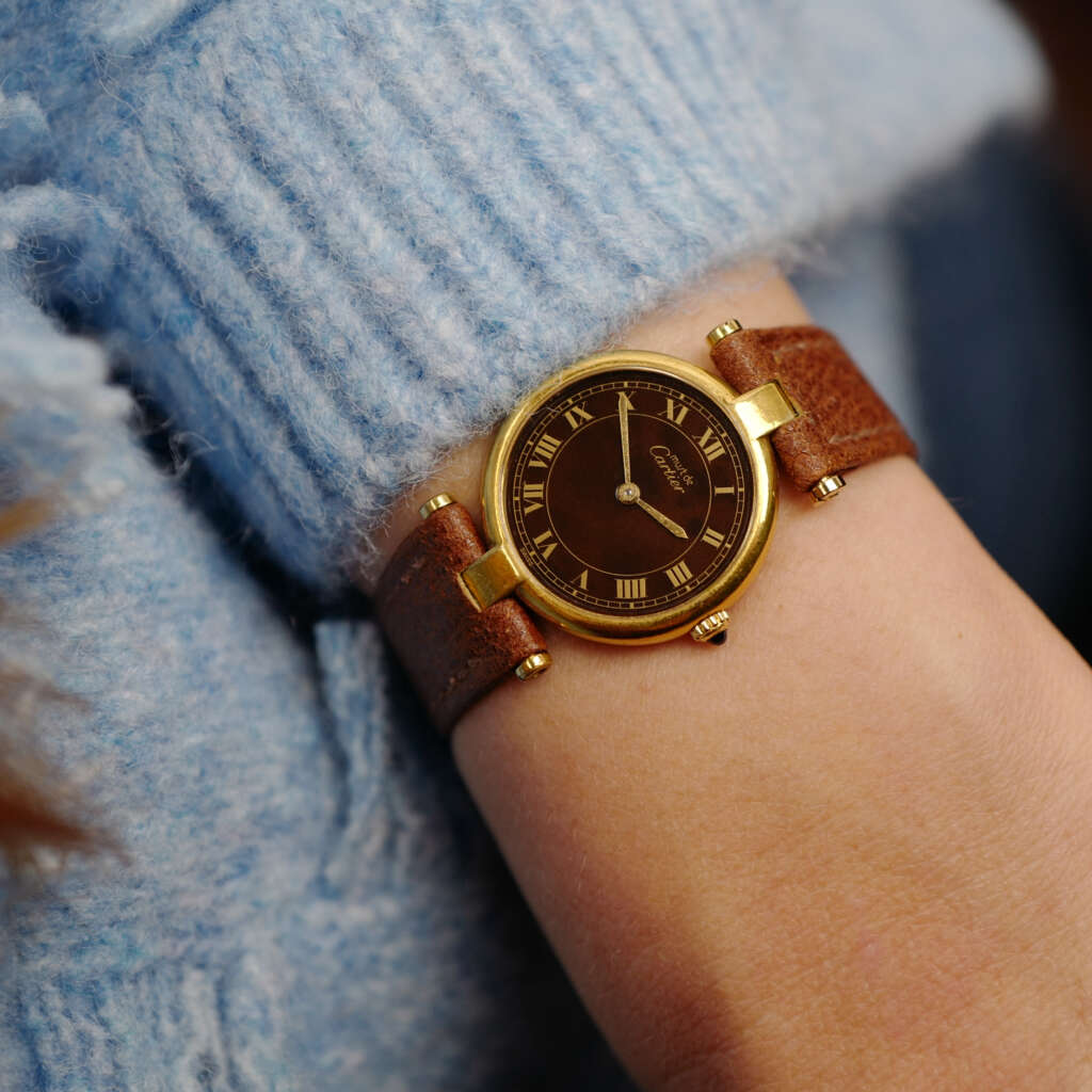 cafe noir les montres vintage horloger marseille CARTIER Vendôme Must ronde Grand Modèle Doré vintage petit modèle ronde patine marron
