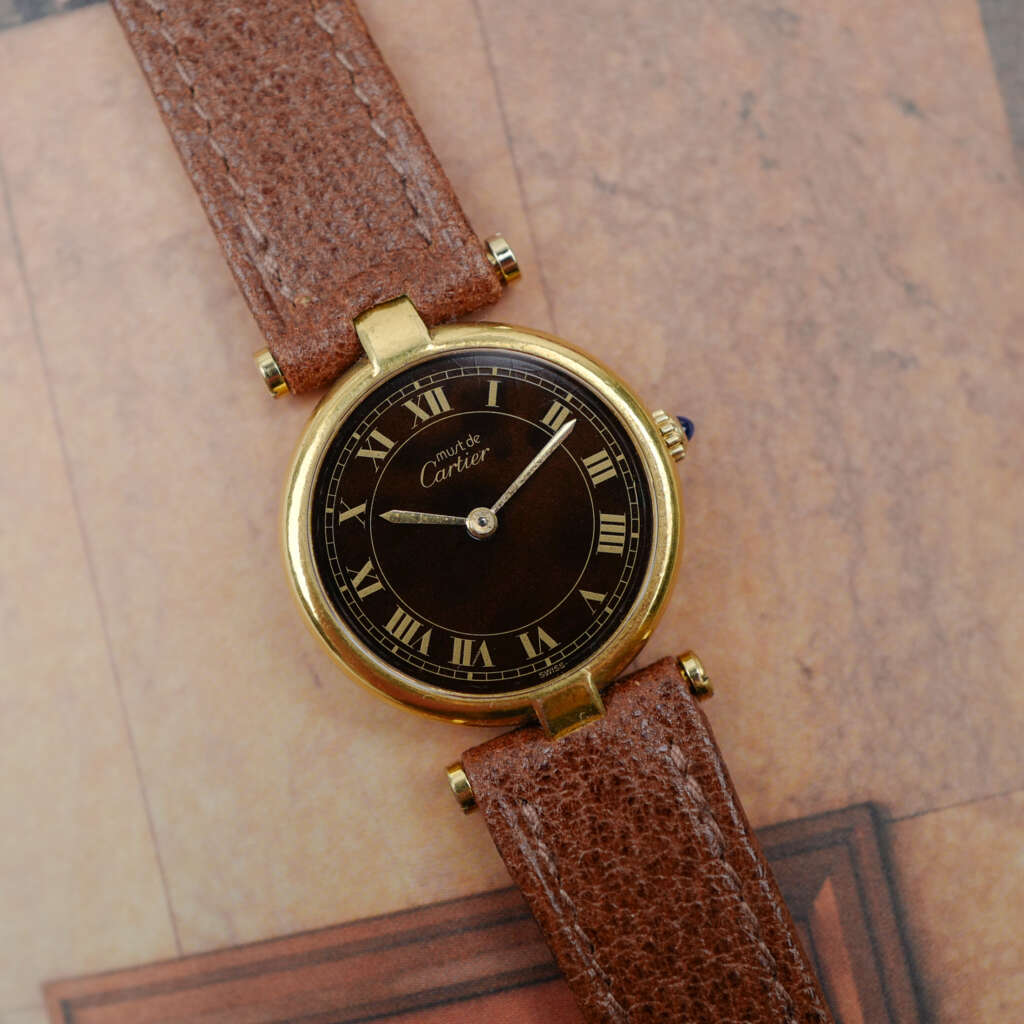 cafe noir les montres vintage horloger marseille CARTIER Vendôme Must ronde Grand Modèle Doré vintage petit modèle ronde patine marron_4 cafe noir les montres vintage horloger marseille CARTIER Vendôme Must ronde Grand Modèle Doré vintage petit modèle ronde patine marron