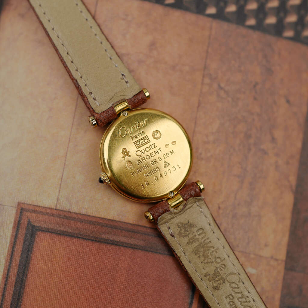 cafe noir les montres vintage horloger marseille CARTIER Vendôme Must ronde Grand Modèle Doré vintage petit modèle ronde patine marron_7 cafe noir les montres vintage horloger marseille CARTIER Vendôme Must ronde Grand Modèle Doré vintage petit modèle ronde patine marron