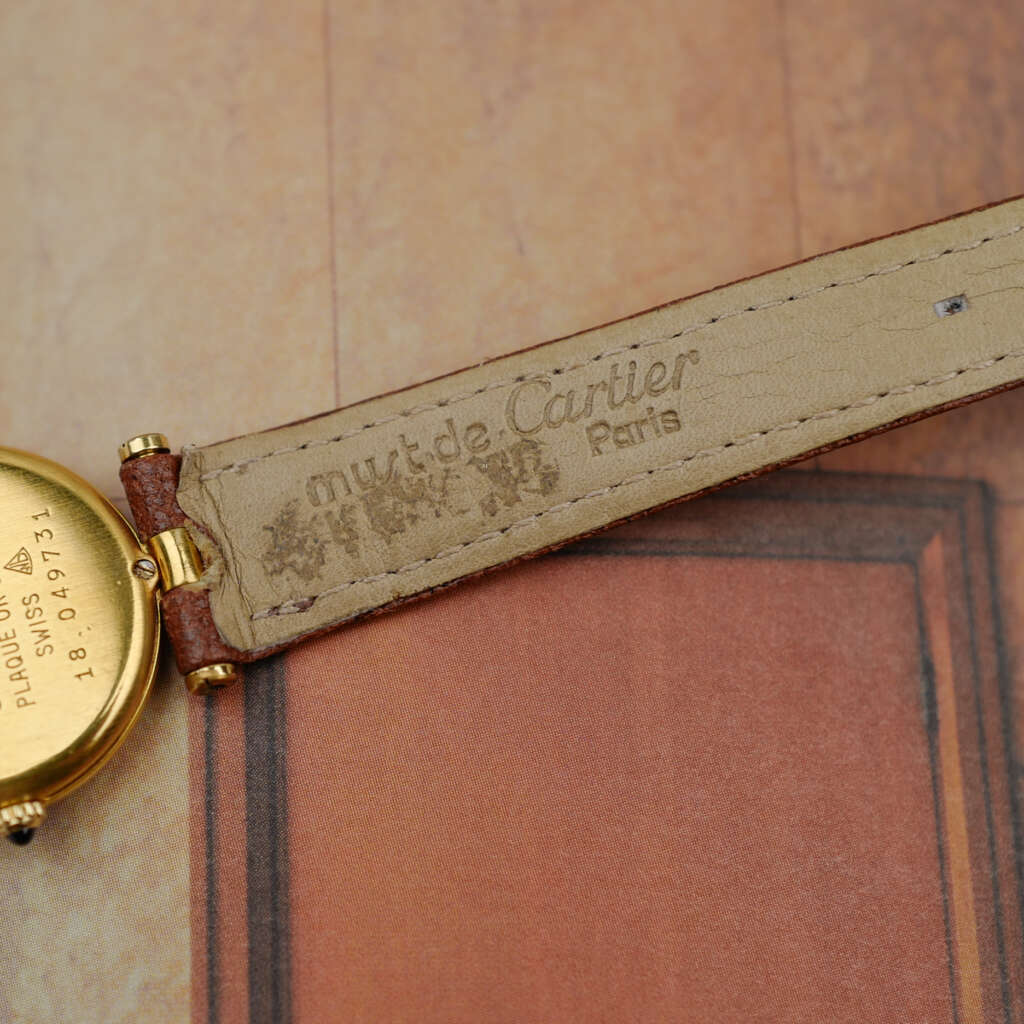 cafe noir les montres vintage horloger marseille CARTIER Vendôme Must ronde Grand Modèle Doré vintage petit modèle ronde patine marron_8 cafe noir les montres vintage horloger marseille CARTIER Vendôme Must ronde Grand Modèle Doré vintage petit modèle ronde patine marron