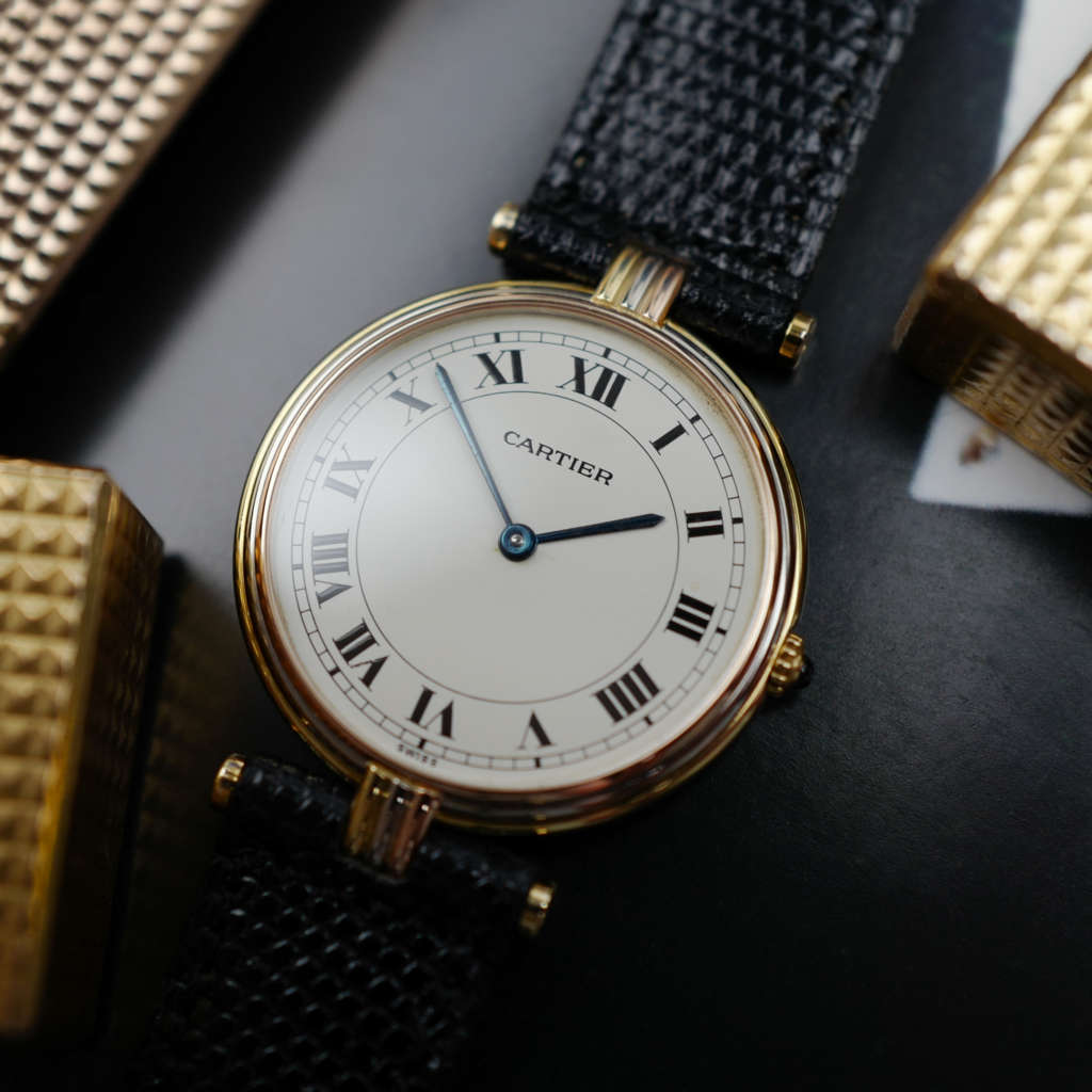 cafe noir les montres vintage horloger marseille CARTIER Vendôme Must ronde Grand Modèle Doré trinity vintage 1980 or 18k