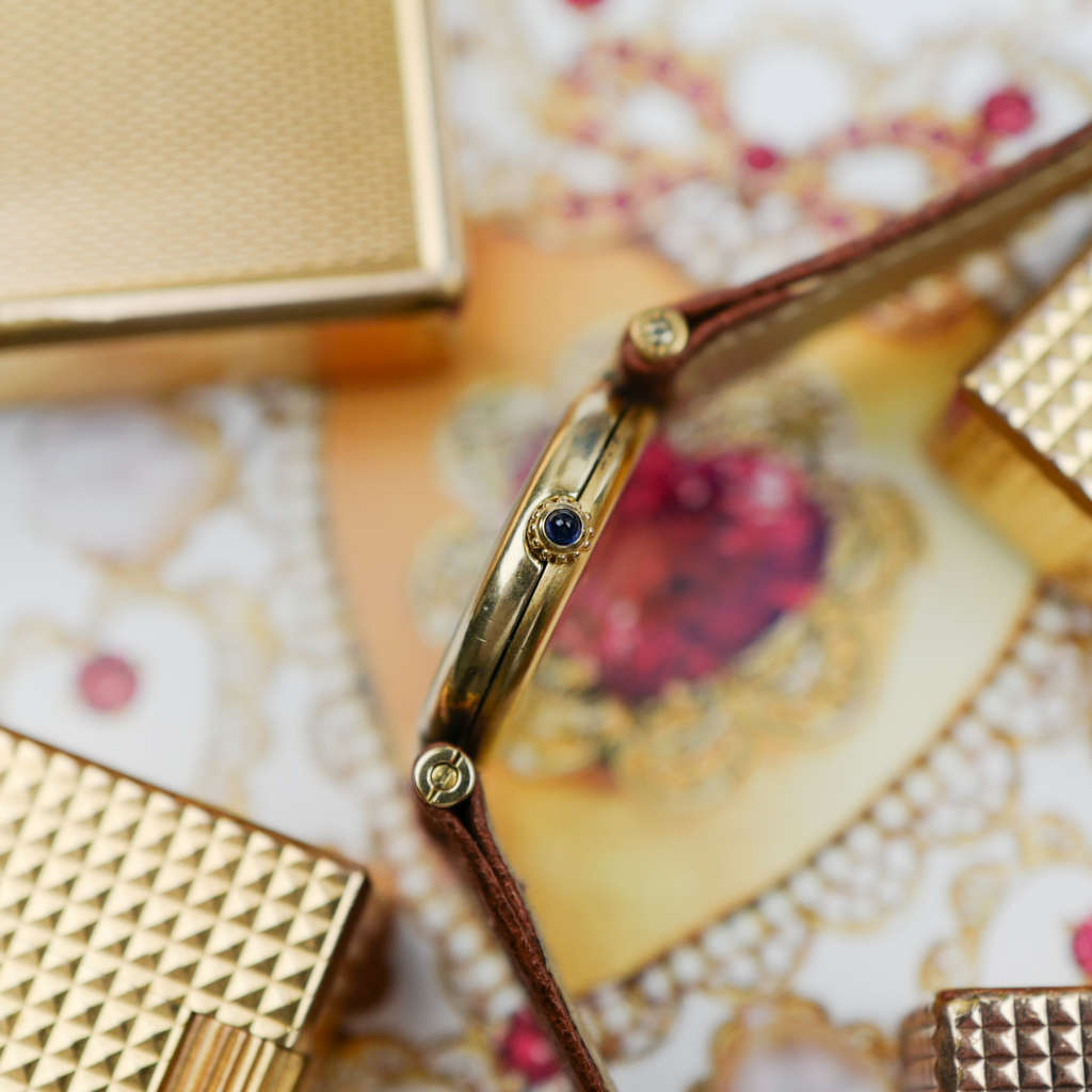 cafe noir les montres vintage horloger marseille CARTIER Vendôme Must ronde Grand Modèle Doré vintage petit modèle ronde patine marron