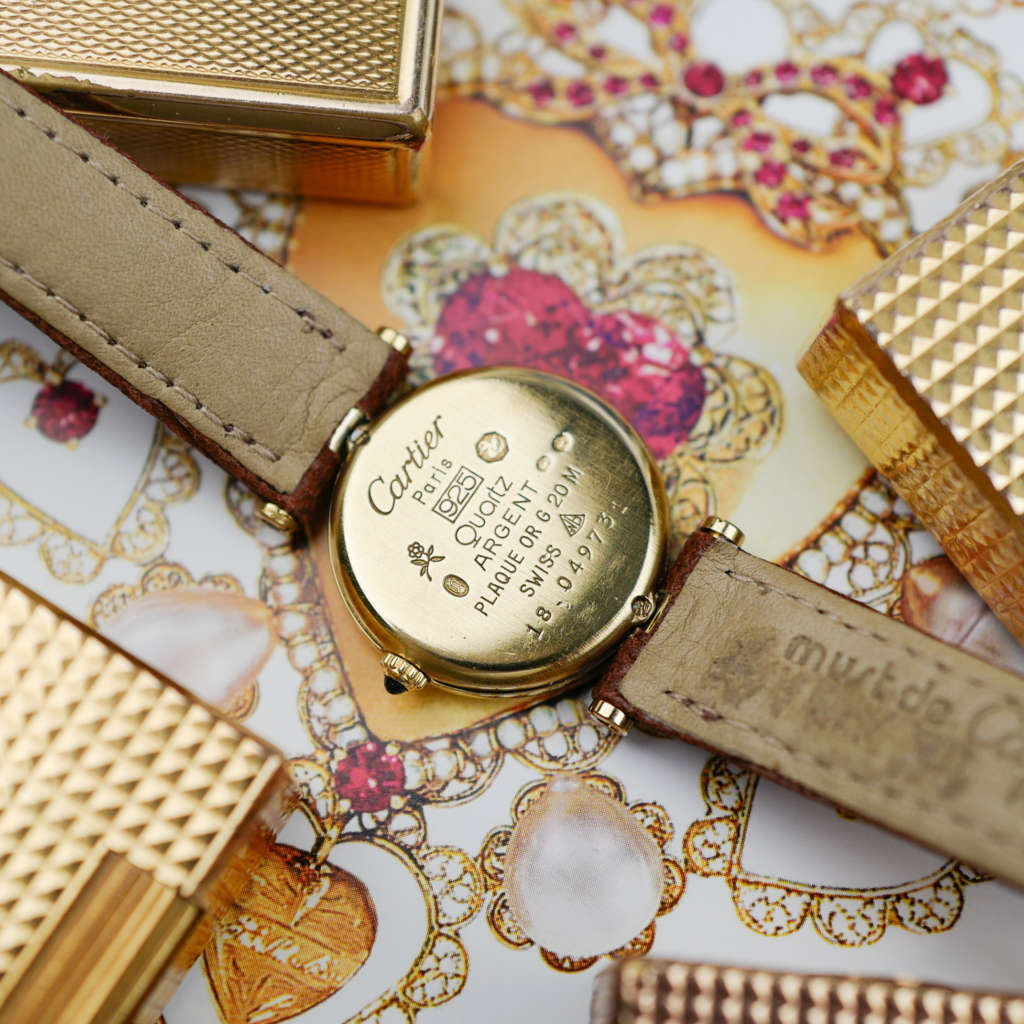 cafe noir les montres vintage horloger marseille CARTIER Vendôme Must ronde Grand Modèle Doré vintage petit modèle ronde patine marron