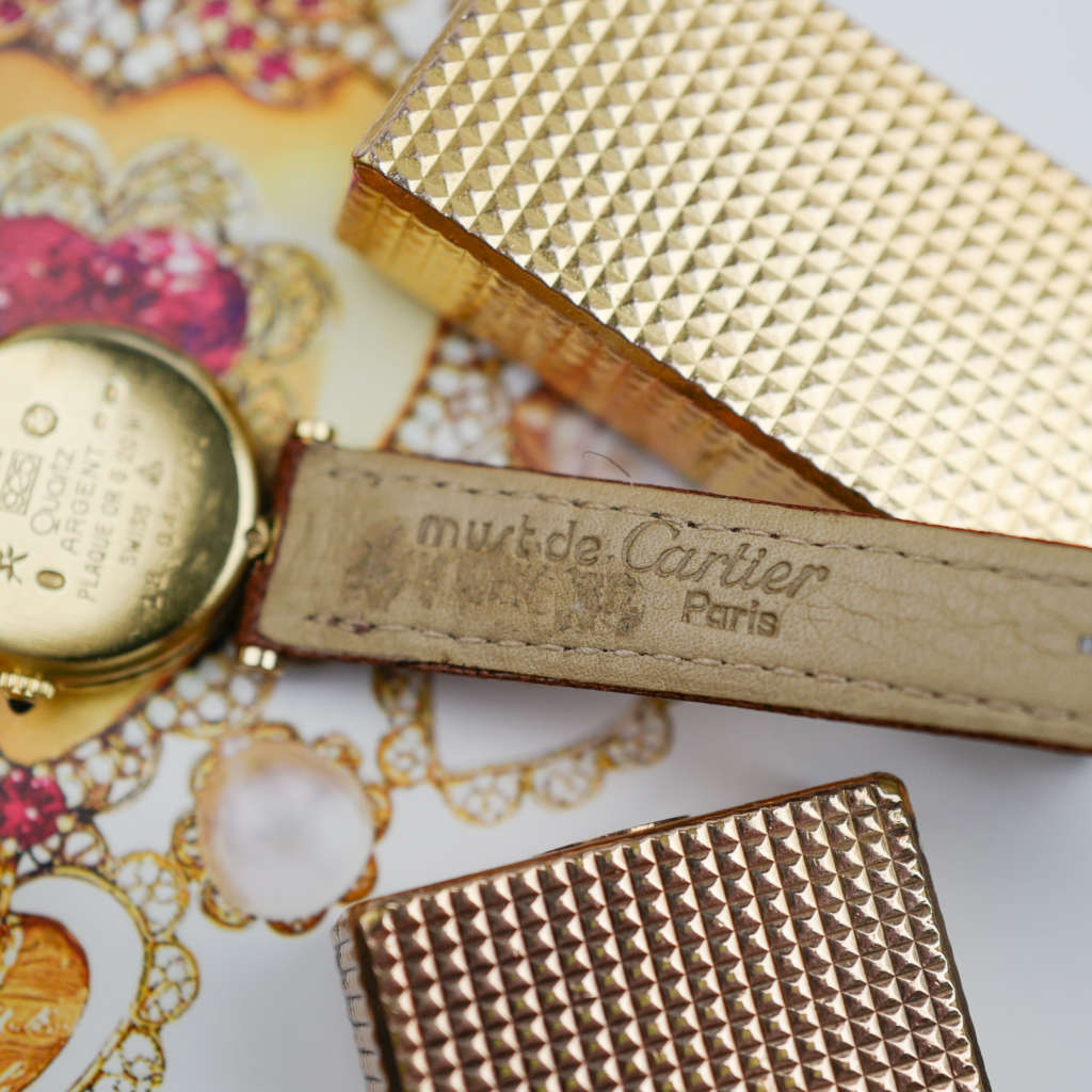 cafe noir les montres vintage horloger marseille CARTIER Vendôme Must ronde Grand Modèle Doré vintage petit modèle ronde patine marron