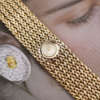cafe-noir-les-montres-bueche-girod-bijou-manchette-jaune-vintage-1960
