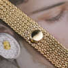 cafe-noir-les-montres-bueche-girod-bijou-manchette-jaune-vintage-1960