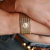 cafe-noir-les-montres-bueche-girod-bijou-manchette-jaune-vintage-1960_2