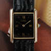 cafe-noir-les-montres-cartier-must-tank-grand-modele-noir-1990