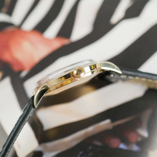 cafe noir les montres vintage horloger marseille zenith-chic-doree-calatrava-1953