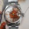 cafe-noir-montres-aix-horloger-rolex-oyster-34-perpetual-date-1500-tropical-tritium-patine-vintage-1969