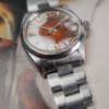 cafe-noir-montres-aix-horloger-rolex-oyster-34-perpetual-date-1500-tropical-tritium-patine-vintage-1969