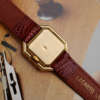 cafe-noir-montres-vintage-horloger-rachat-marseille-aix-cartier-ceinture-cadran-paris-or-jaune-vintage-annees-1960-grande
