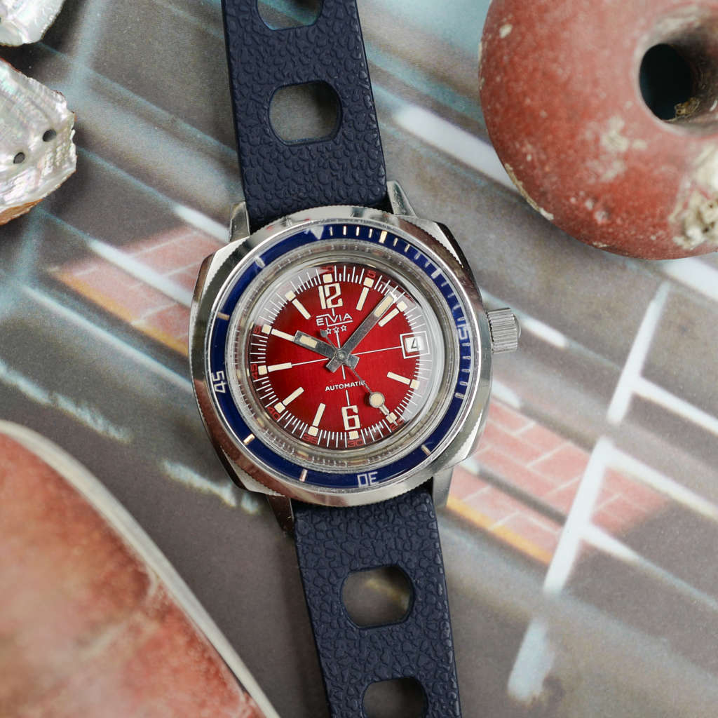 cafe-noir-montres-acaht-vente-marseille-elvia-baby-panerai-vintage-bakelite-rouge-1970-diver
