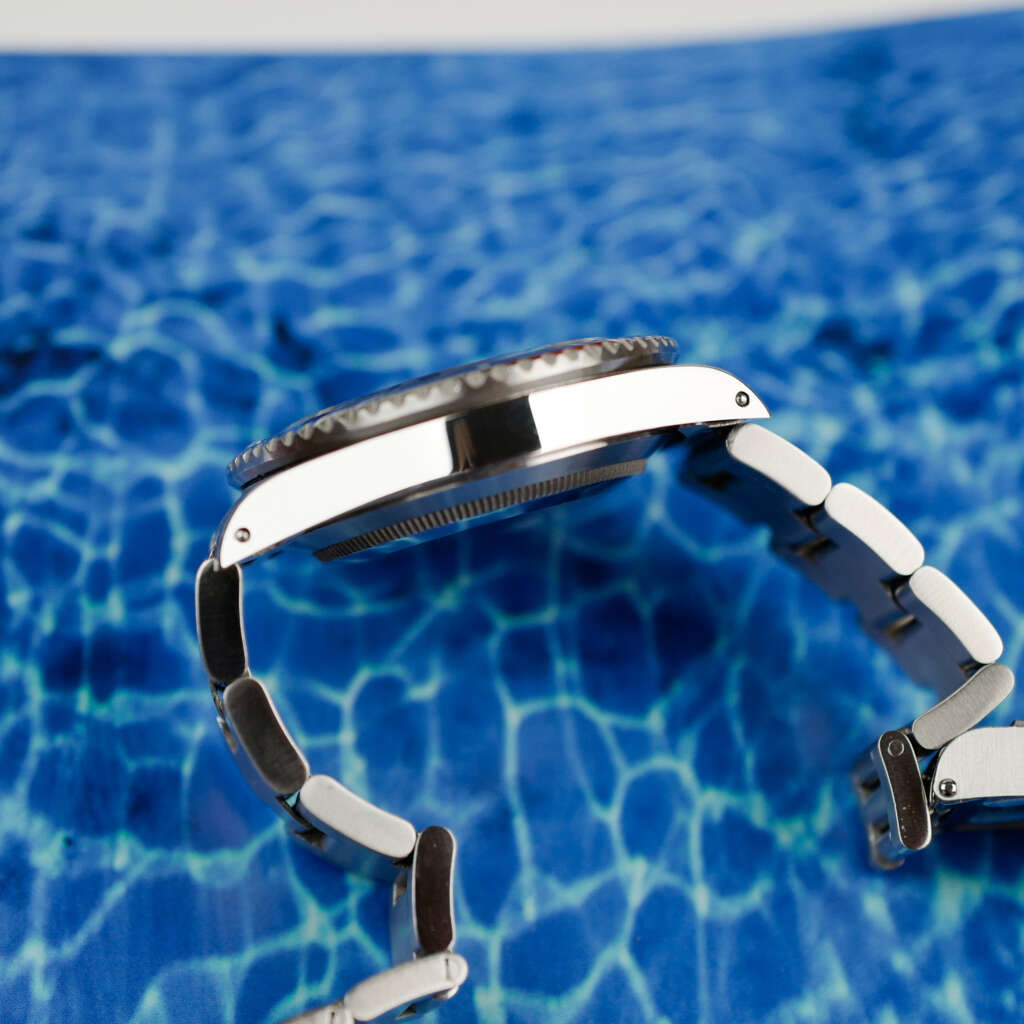 cafe-noir-montres-vintage-marseille-aix-horlorger-rolex-submariner-168000-triple-000-modele-de-transition-vintage-1986