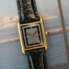cartier-tank-must-de-cartier-gm-cadran-noir-sectoriel-vintage-annees-1990