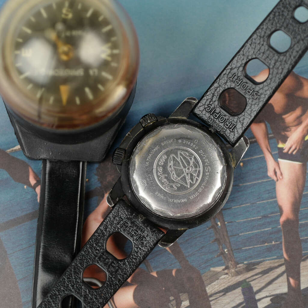 cafe-noir-montre-vintage-marseille-horloger-enicar-sherpa-ops-ultrasonic-militaire-1960