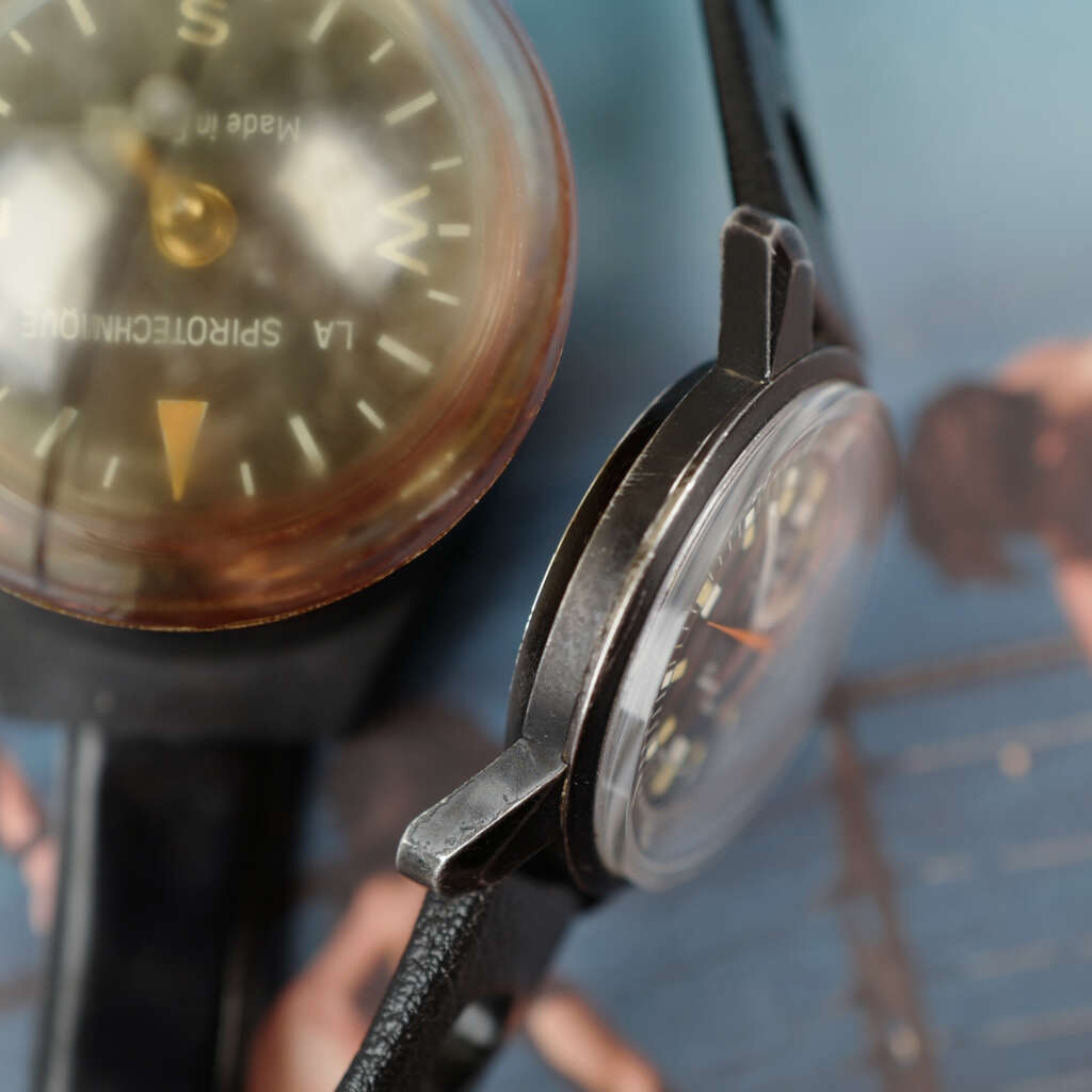 cafe-noir-montre-vintage-marseille-horloger-enicar-sherpa-ops-ultrasonic-militaire-1960