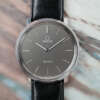cafe-noir-montre-vintage-marseille-horloger-omega-fine-gris