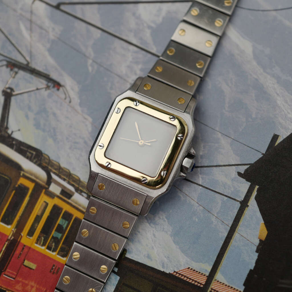 cafe-noir-montre-vintage-marseille-horloger-cartier-santos-ghost-petit-modele-femme-or-acier-1990