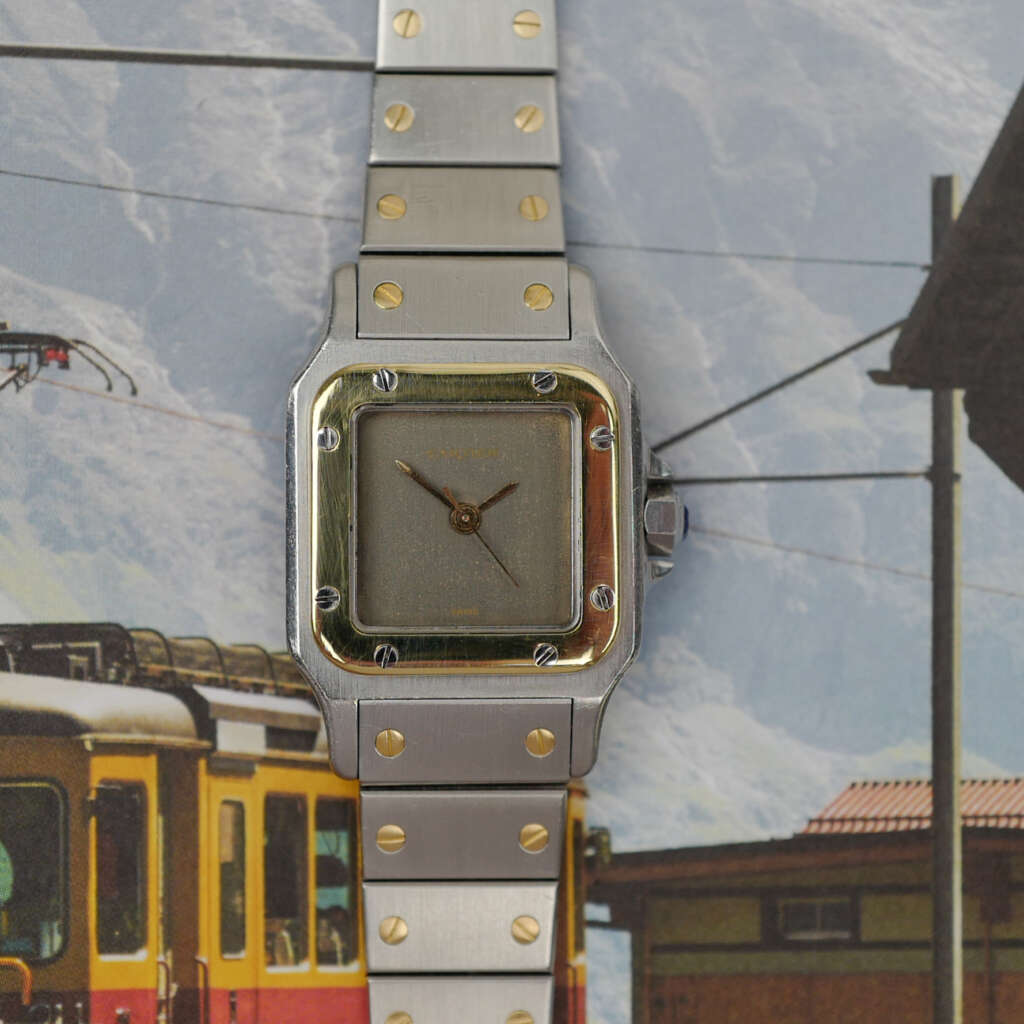 cafe-noir-montre-vintage-marseille-horloger-cartier-santos-ghost-petit-modele-femme-or-acier-1990