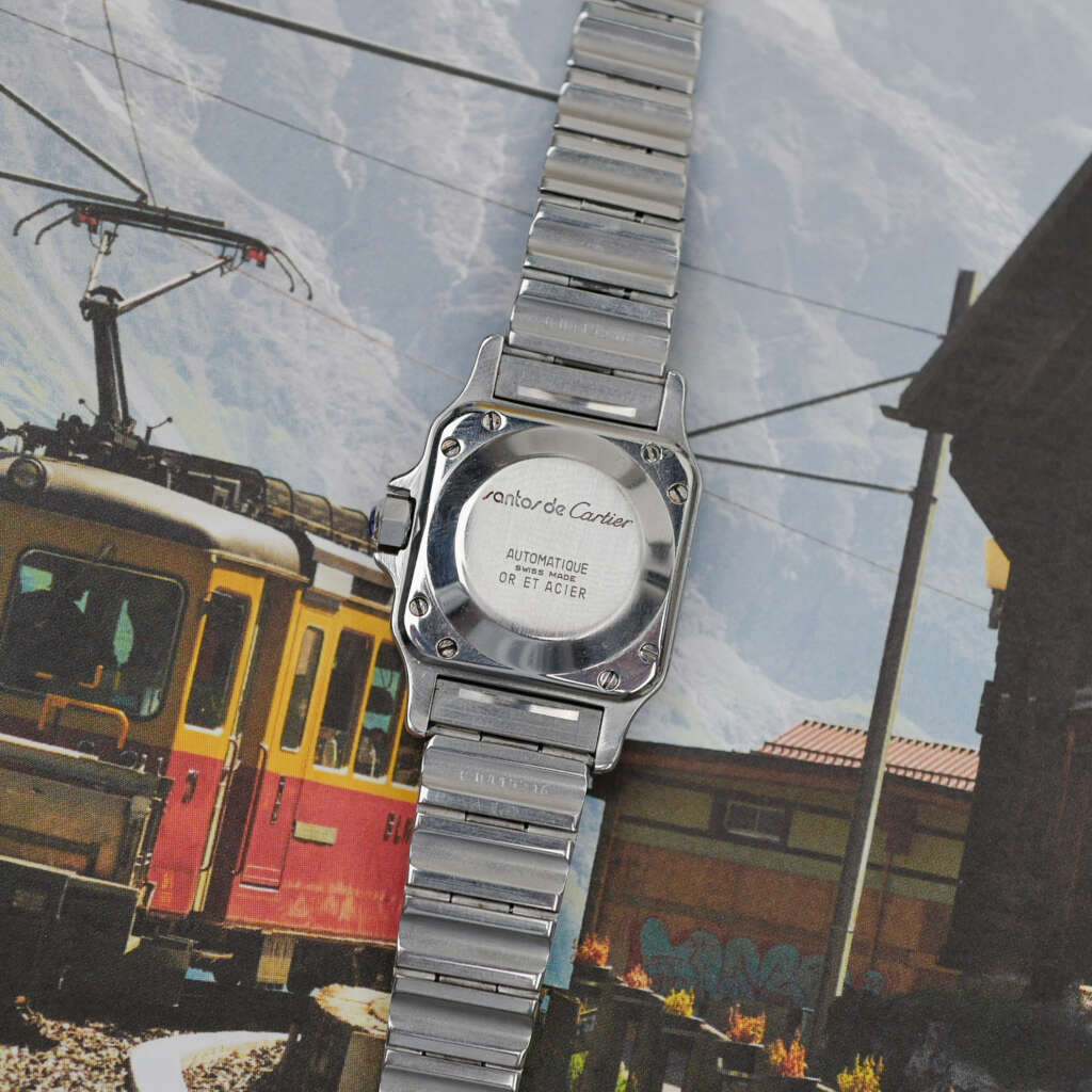 cafe-noir-montre-vintage-marseille-horloger-cartier-santos-ghost-petit-modele-femme-or-acier-1990