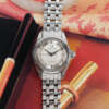 cafe-noir-montre-vintage-marseille-horloger-universal-geneve-mini-polerouter-lady-gay-freres-1960