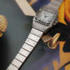 cafe-noir-montre-vintage-marseille-horloger-cartier-santos-galbee-petit-modele-acier-automatique-1990