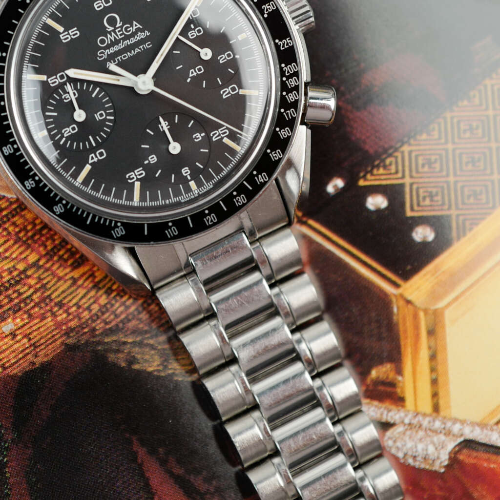 cafe-noir-montre-vintage-marseille-horloger-omega-speedmaster-reduced-tritium-1750032-automatique-1980