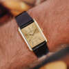 cafe-noir-montre-vintage-marseille-horloger-baume-mercier-tank-or-massif-18k-nos-1988