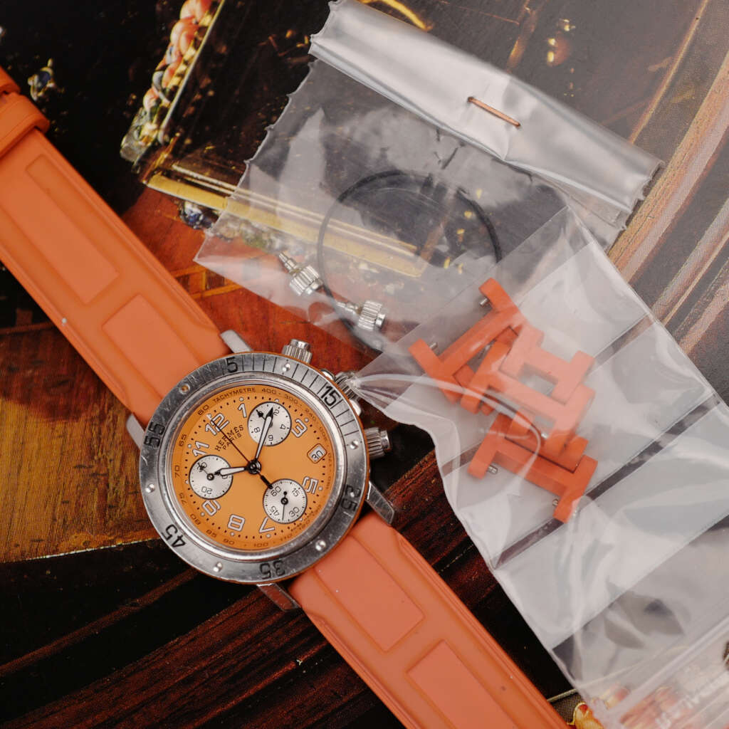 cafe-noir-montre-vintage-marseille-horloger-hermes-clipper-chronographe-orange-33mm-cl2316