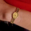 cafe-noir-montre-vintage-marseille-horloger-omega-de-ville-mini-ellipse-doree