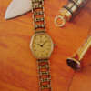 cafe-noir-montre-vintage-marseille-horloger-omega-de-ville-mini-ellipse-doree