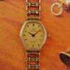cafe-noir-montre-vintage-marseille-horloger-omega-de-ville-mini-ellipse-doree