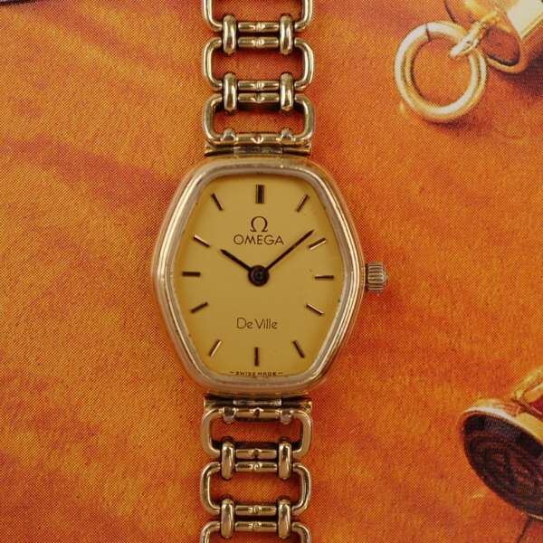 cafe-noir-montre-vintage-marseille-horloger-omega-de-ville-mini-ellipse-doree