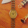 cafe-noir-montre-vintage-marseille-horloger-omega-de-ville-mini-ellipse-doree